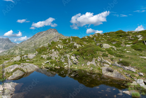 Landscape near Riederalp with small mountain lake and Bettmerhorn