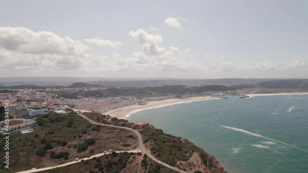 Panoramic view of Nazare beach and Atlantic ocean coast, Portugal. Charming beach resort town Panoramic view of Nazare beach and Atlantic ocean coast, Portugal. Charming beach resort town