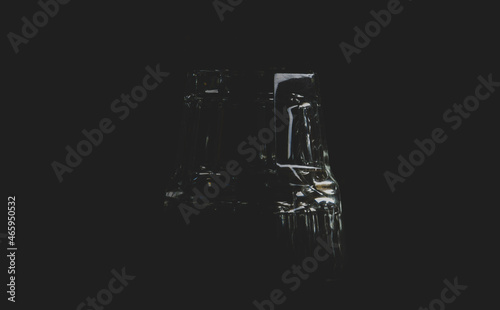 glass for whiskey on black matte background © Hro Sev