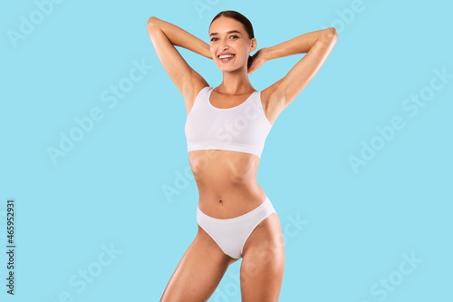 Photos Happy Lady Posing Isolated On Blue Studio Background