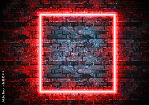 Brick wall background with color neon glowing light