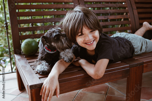 Child and schnauzer