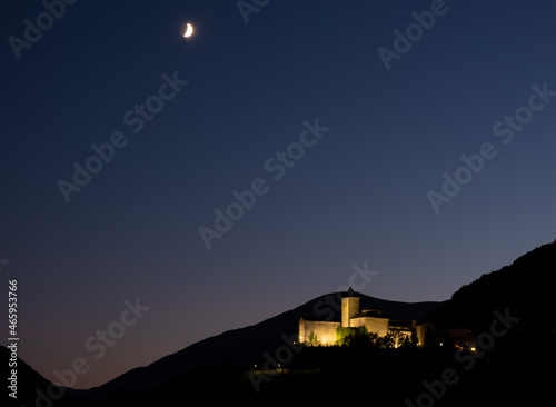 The moon over Torla at sunset, Huesca, Spain.