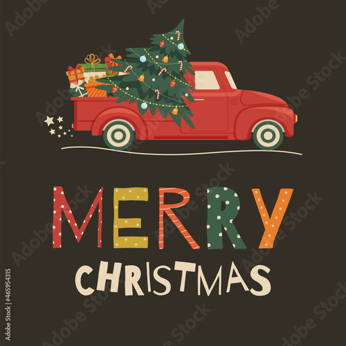 Merry Christmas card with festive lettering and vintage red truck with pine tree and gifts
