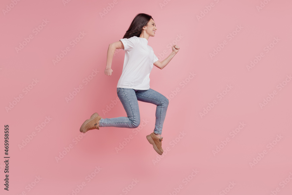 Full size profile side photo of young girl go walk run hurry sale isolated over pink color background