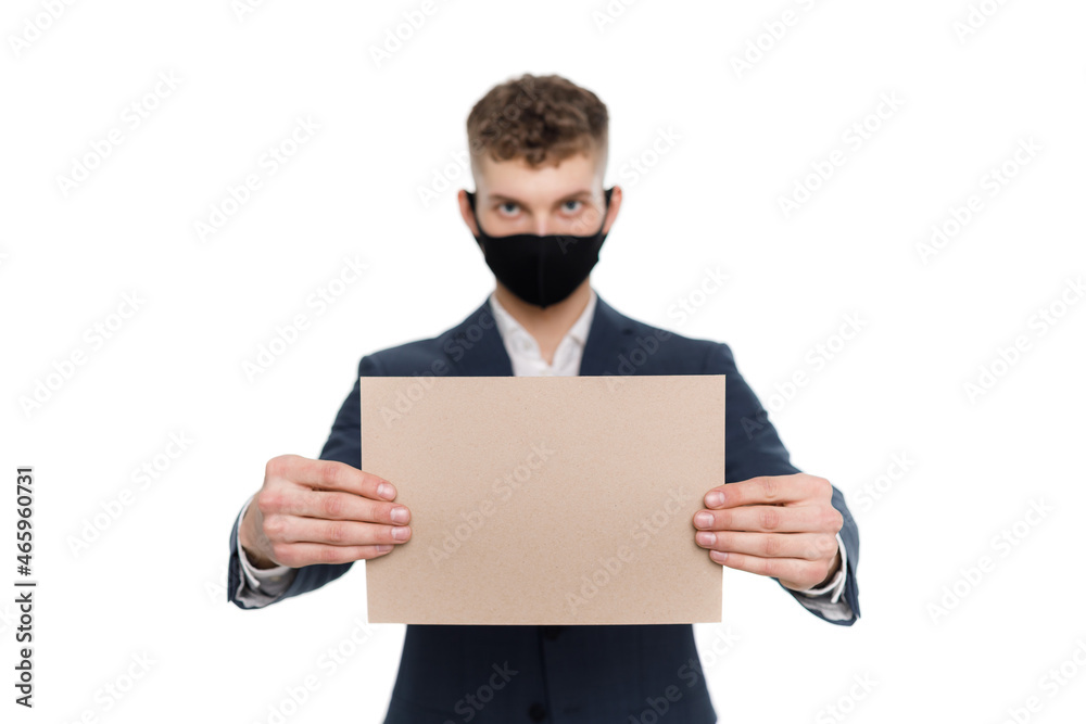 Young businessman is showing the word. Your text here