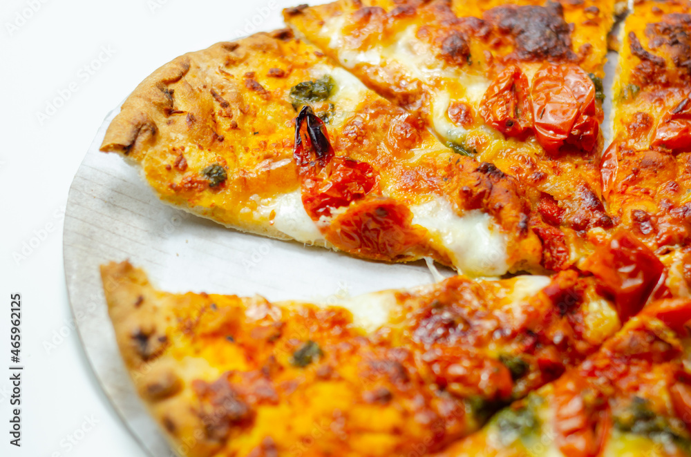 Delicious Neapolitan pizza based on buffalo mozzarella and tomatoes, italian cuisine Delicious Neapolitan pizza based on buffalo mozzarella and tomatoes, italian cuisine