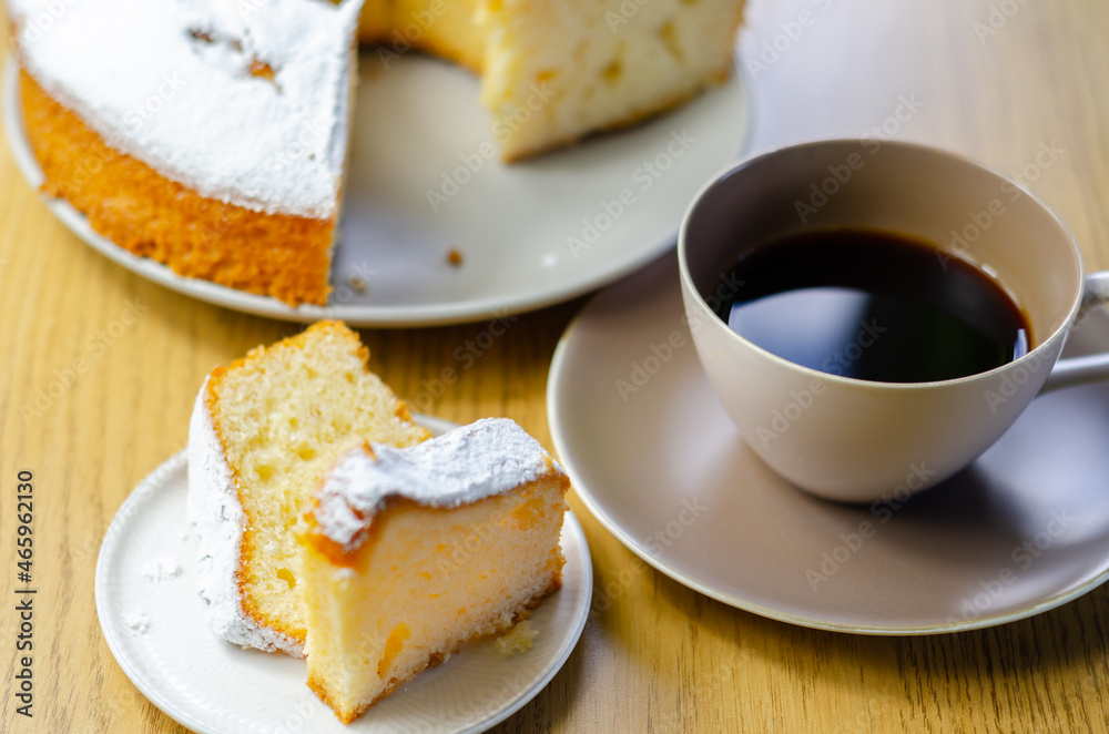 Portion of Madeira ring loaf cake served on a small plate Portion of Madeira ring loaf cake served on a small plate