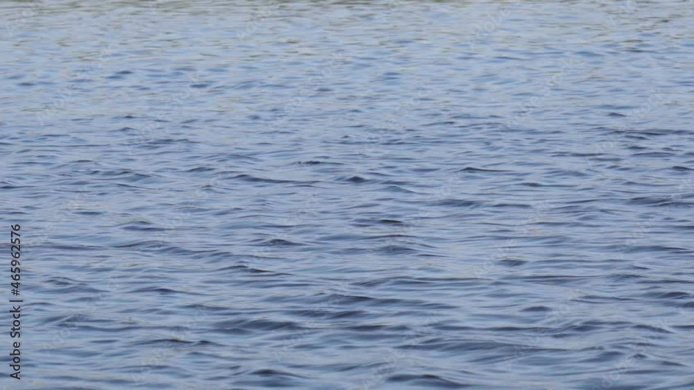 River water with shining water when traveling and tourism. Selective focus, water movement River water with shining water when traveling and tourism. Selective focus, water movement