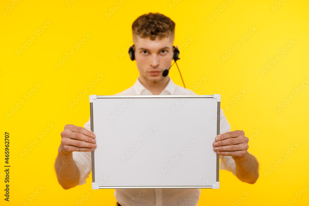 Young businessman is showing the word. Your text here Young businessman is showing the word. Your text here