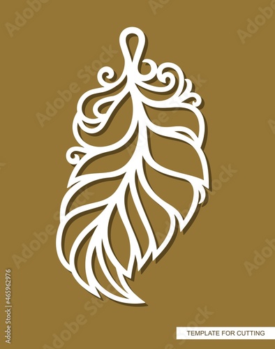 White feather pendant on brown background. Keychain, jewelry pendant, hanging Christmas tree decoration. Template for plotter laser cutting of paper, metal engraving, wood carving, cnc. Vector image.