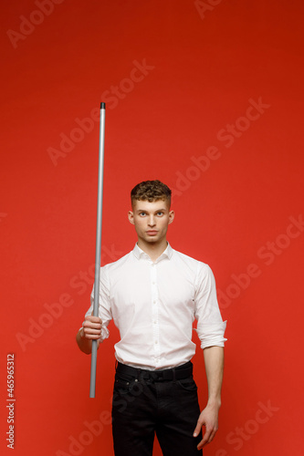 Young businessman is showing the word. Your text here