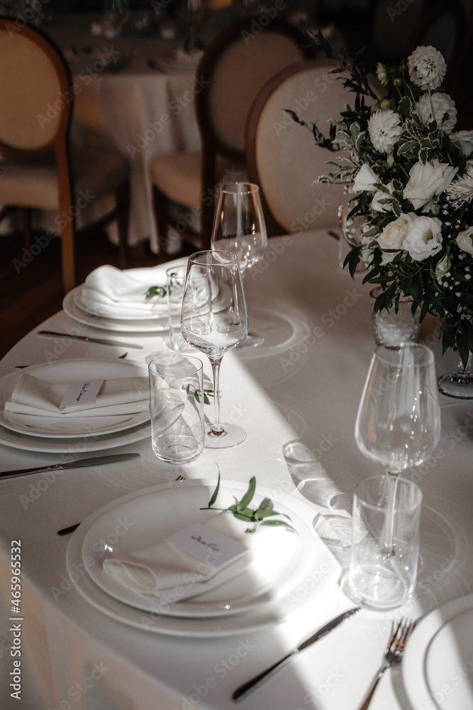 Fototapeta premium beautiful wedding decor. banquet table with flowers and tableware