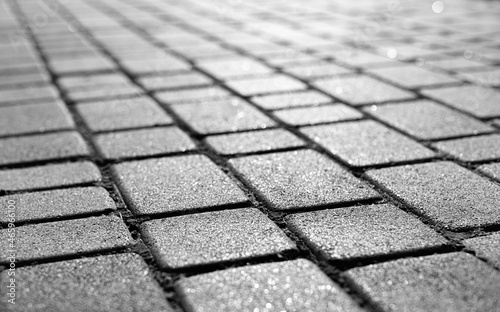 Brick stone street road. Pavement abstract texture.