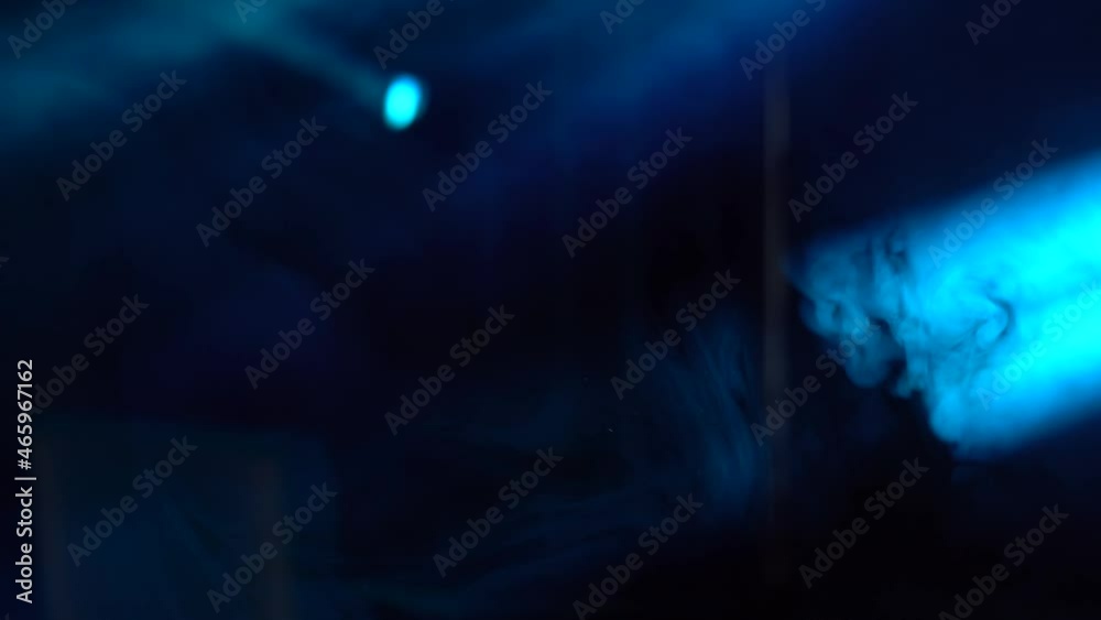 Laser neon blue light rays flash and glow in seamless loop. Festive concert club and music hall abstract. pop, rock, rap music show.