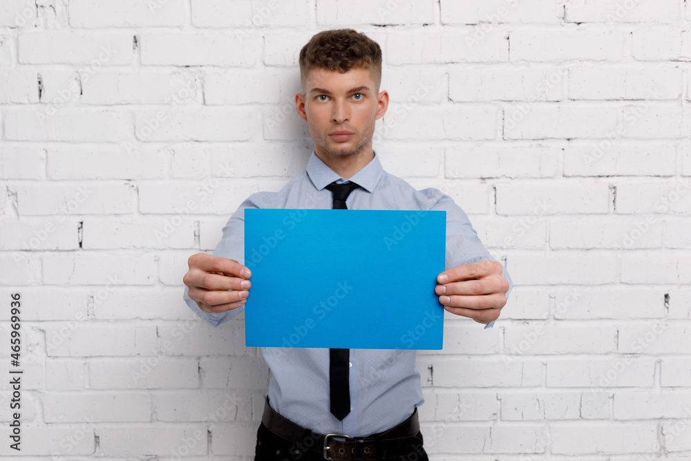 Young businessman is showing the word. Your text here Young businessman is showing the word. Your text here