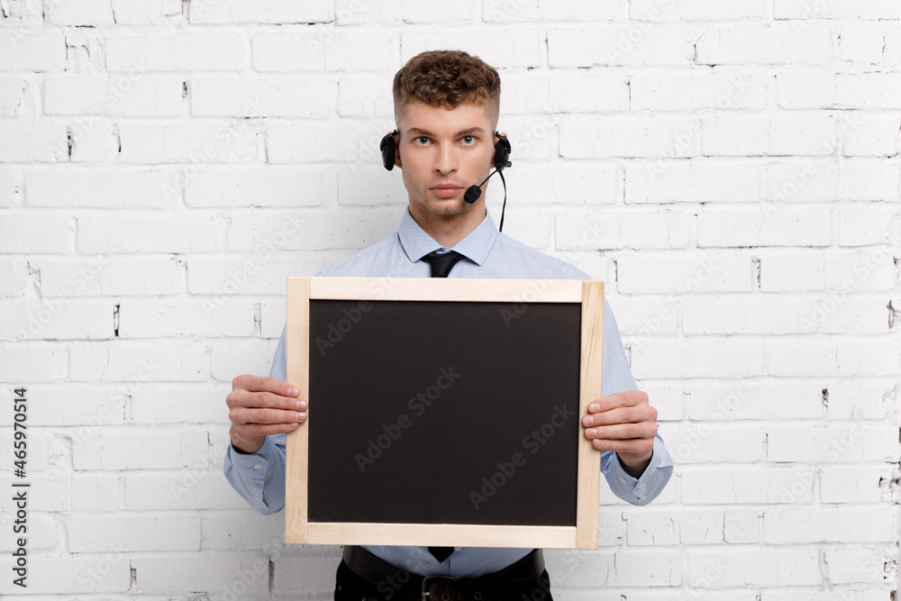 Young businessman is showing the word. Your text here Young businessman is showing the word. Your text here