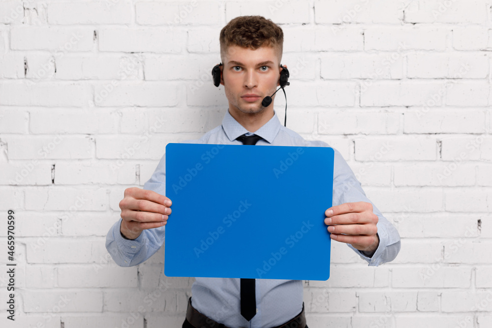 Young businessman is showing the word. Your text here Young businessman is showing the word. Your text here