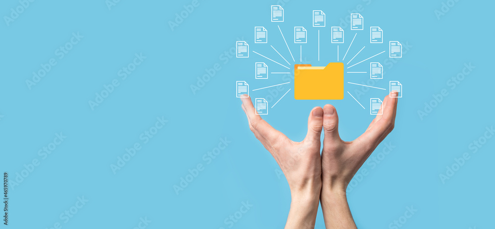 Document Management System DMS .Businessman hold folder and document icon.Software for archiving, searching and managing corporate files and information.Internet Technology Concept.Digital security. Document Management System DMS .Businessman hold folder and document icon.Software for archiving, searching and managing corporate files and information.Internet Technology Concept.Digital security.