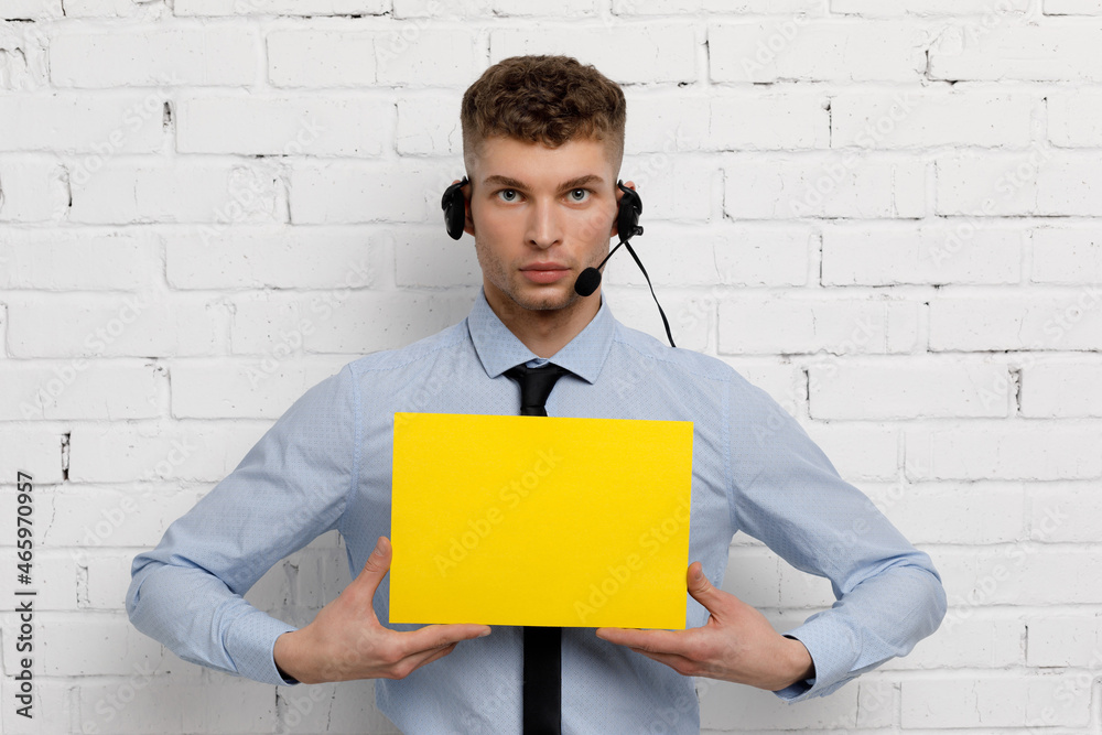 Young businessman is showing the word. Your text here Young businessman is showing the word. Your text here