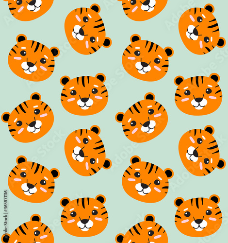 Vector seamless pattern of hand drawn flat tiger face isolated on mint background