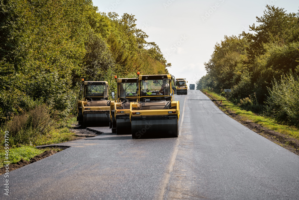 road rollers lay new asphalt