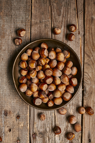 ripe hazelnuts in a rustic bowl