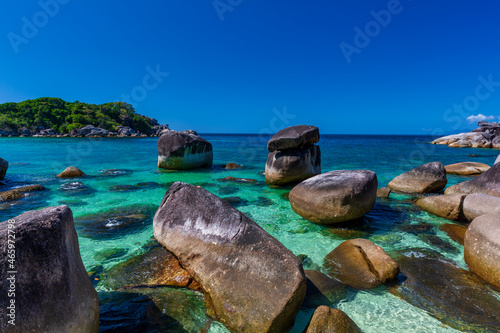 The beautiful and secluded Moken Bay of Boulder Island in Myanmar covering with so many boulders on the beach
