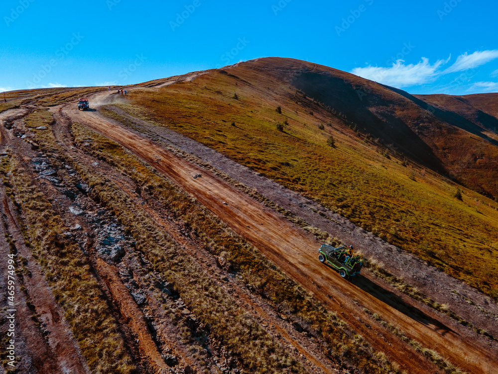 aerial view of off road attraction road to the top of carpathian mountains