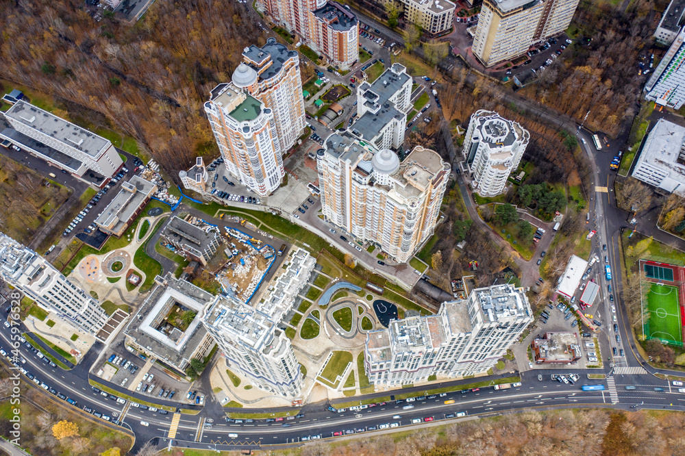 Fototapeta premium urban landscape with playgrounds in a residential complex on an autumn day filmed from a drone 