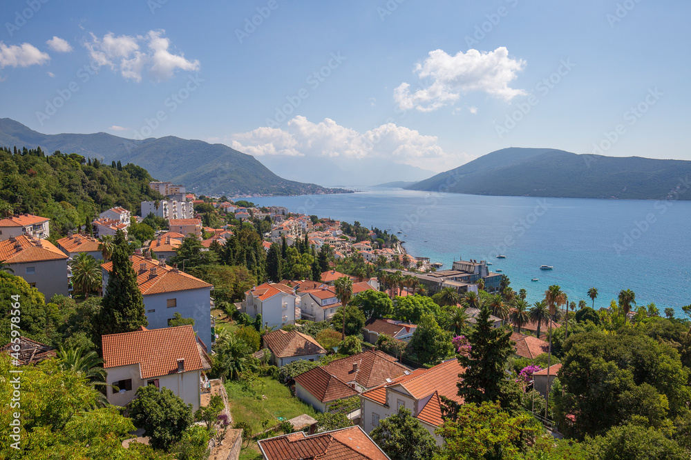 View of the city of Herceg Novi, blue sea and tiled red roofs in Montenegro, Europe