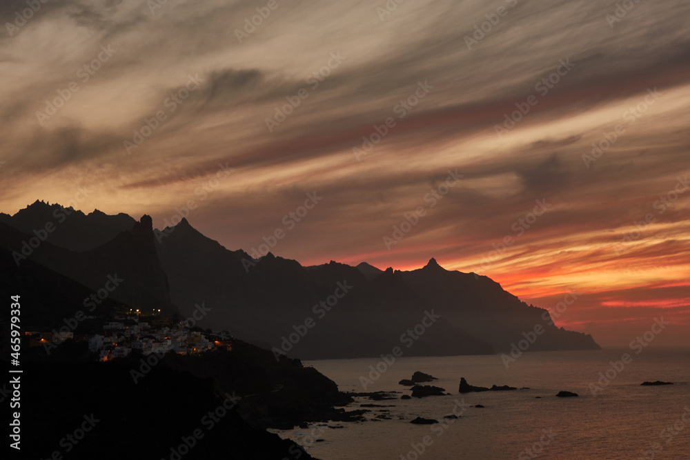 Fototapeta premium Between the Roques de Benijo and La Rapadura is one of the most beautiful virgin beaches in the north of the island: Benijo Beach. The black sand of this small beach in Tenerife and the landscape..