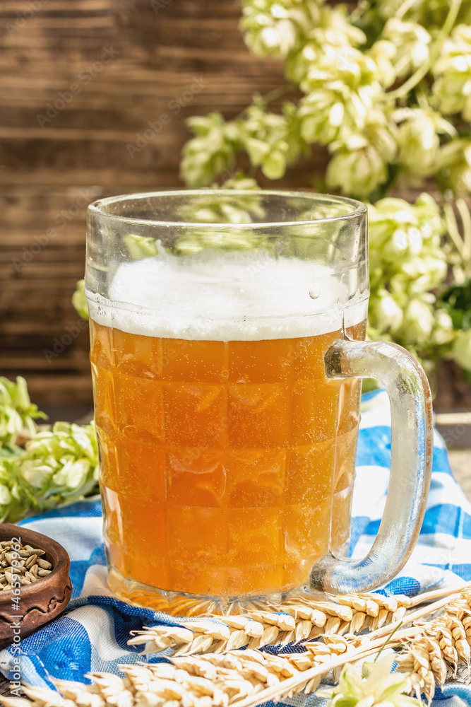 Oktoberfest set. Light beer, spikelets of grain, hop. Traditional German cuisine, festival food Oktoberfest set. Light beer, spikelets of grain, hop. Traditional German cuisine, festival food