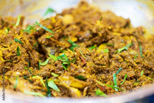 Closeup of Tai Pla, Southern Style Spicy Dry Fish​ Stomach with Fermented Organ​ Paste, thai street food market