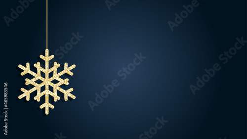 Gold Christmas card. Gold snowflake on navy blue background