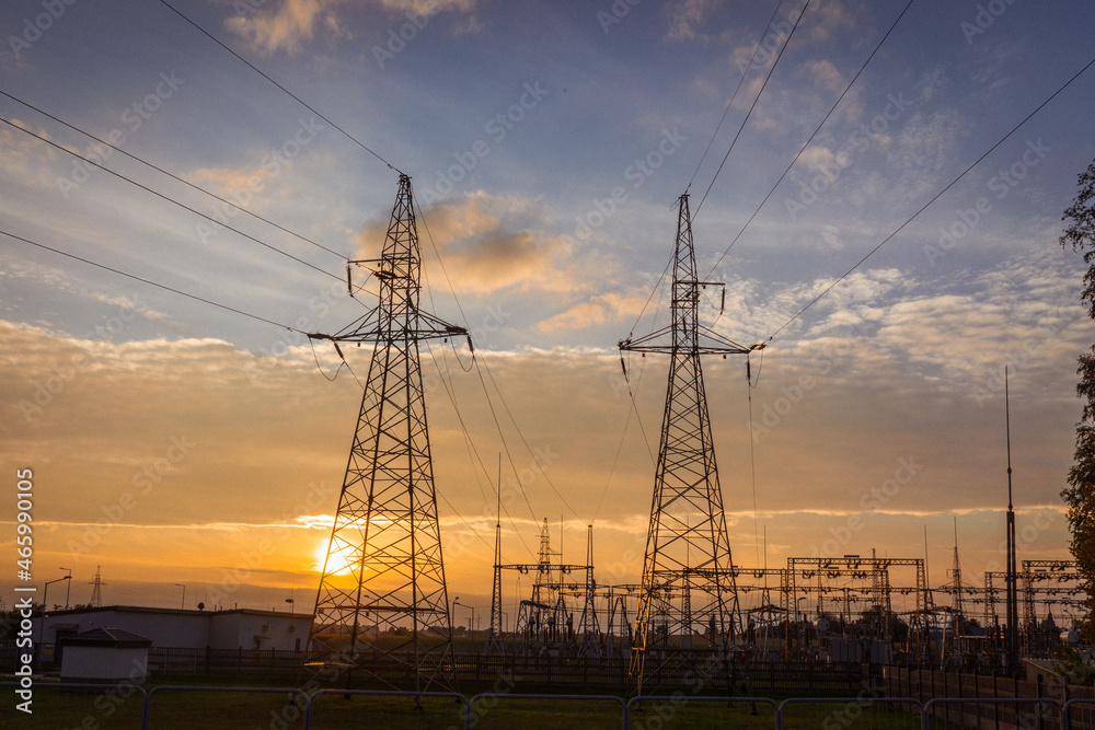 Pylons and power lines against the backdrop of the sunset. Pylons and power lines against the backdrop of the sunset.