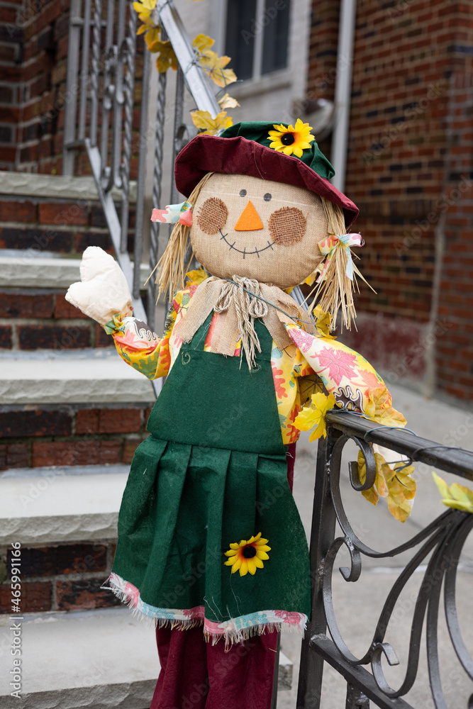 Straw doll on the stairs