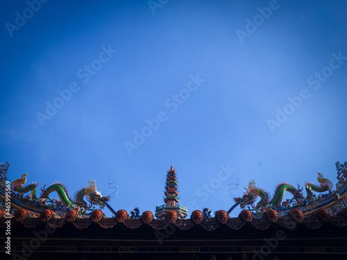roof of chinese temple  have Dragon and tower