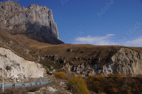 Mountain view on a clear autumn day. Mountains in Ingushetia. Landscape in the mountains in autumn. Roads in the mountains. Base jumping mountain. 