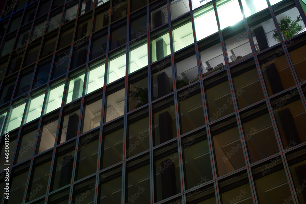 Facade of office tower at autumn night at industrial district of City of Zürich. Photo taken October 9th, 2021, Zurich, Switzerland.