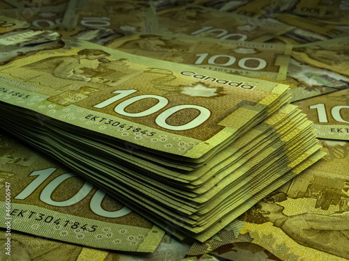 Canadian money. Canadian dollar banknotes. 100 CAD dollars bills.