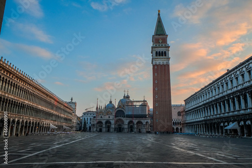 Venice's San Marco square with its cathedral and bell tower at sunrise