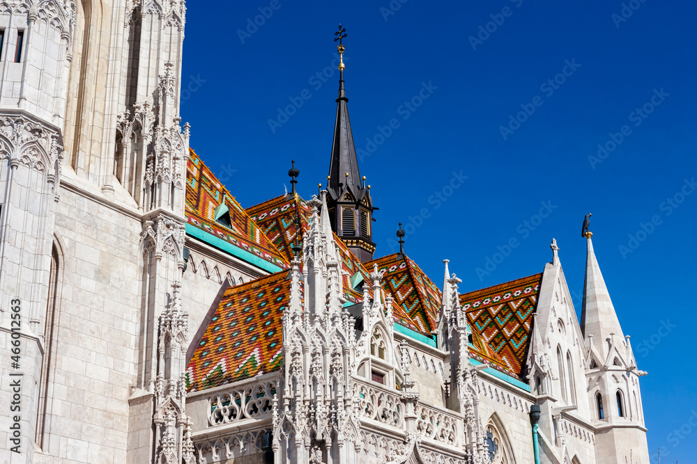 Fototapeta premium Glorious tiled roof and spires of Matyas Church, Várhegy, Budapest, Hungary