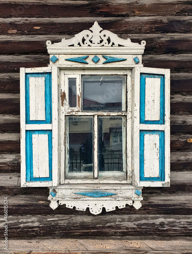 Carved platbands of old wooden windows