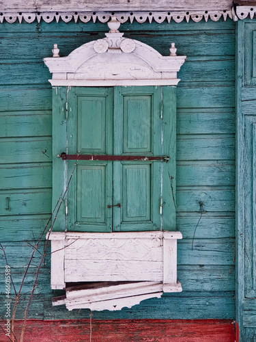 Carved platbands of old wooden windows