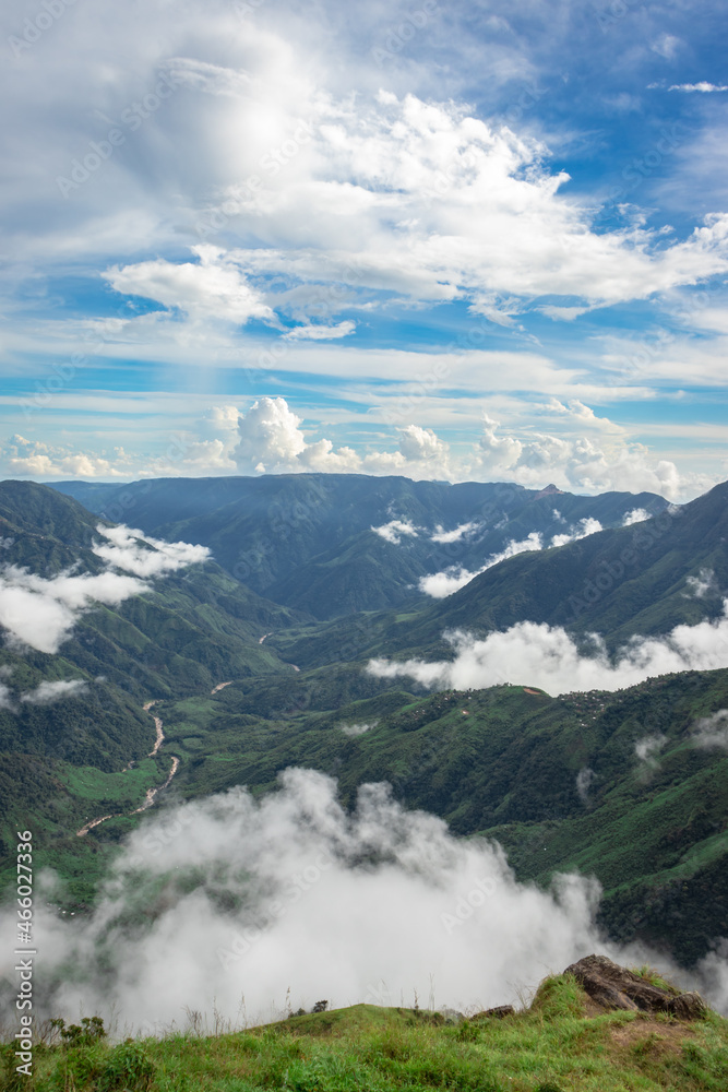 mountain range valley filled with low clouds with dramatic sky at morning mountain range valley filled with low clouds with dramatic sky at morning