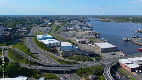 Panoramic aerial view of Fish Island and Popes Island on Acushnet River and ships docked at New Bedford port in city of New Bedford, Massachusetts MA, USA. photo