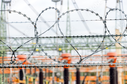 Barbed wire on a fence restricting entry to an electricity substation