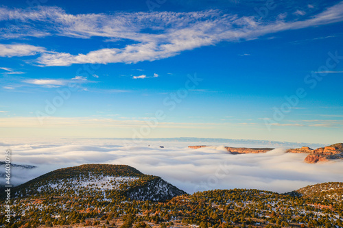 Castle Valley clouds cover fisher tower