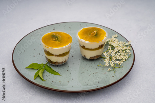 Lulo desserts with leaves on a marble background
